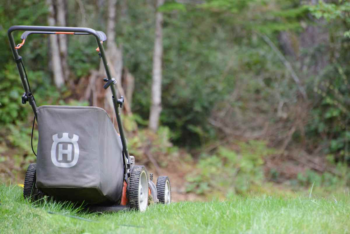 lone lawnmower on a lawn 