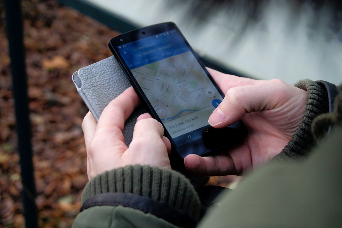 A close-up of someone using Google Maps on an Android smartphone.